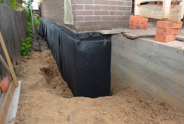 Happy homeowners after waterproofing job in Lynbrook